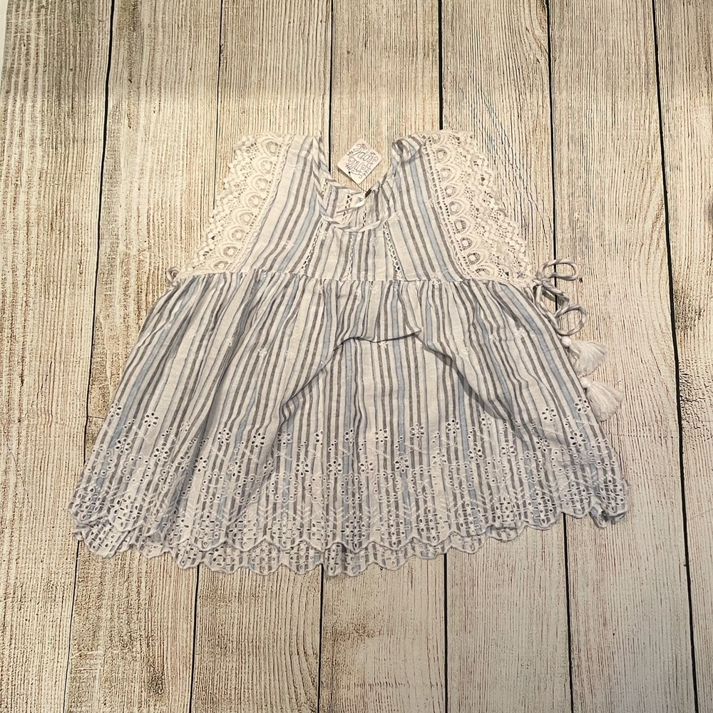 NWT Free People Swingy Open side tank top